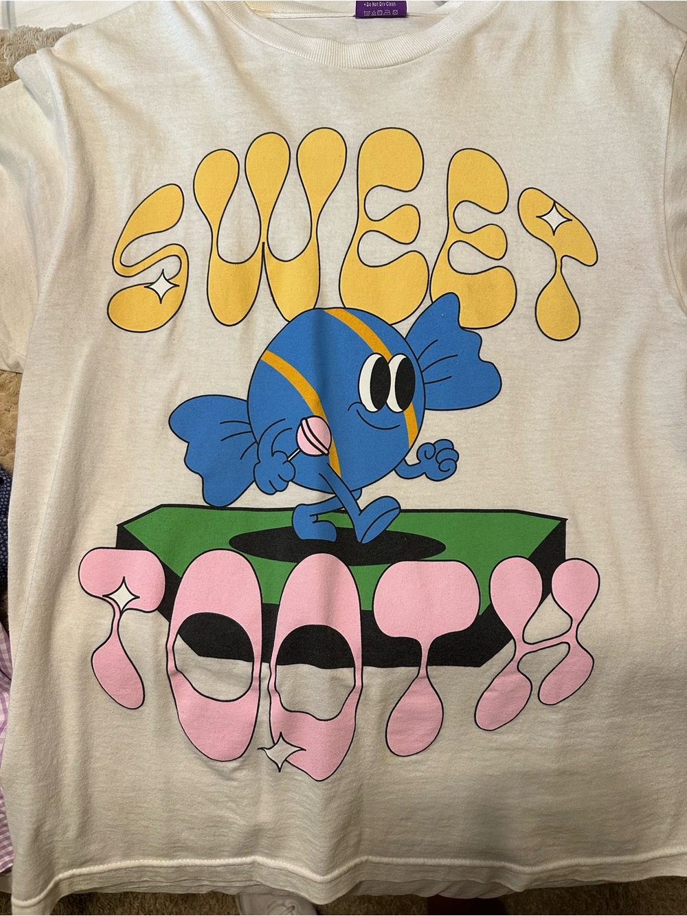 Cody Ko “Sweet Tooth”White Graphic Short-Sleeve Tee with Playful Candy Character